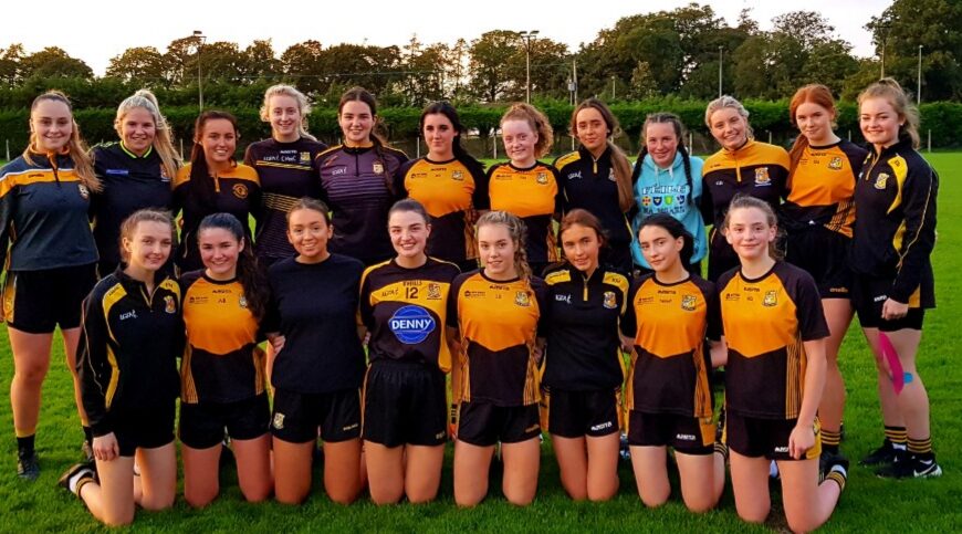Junior girls win relegation battle